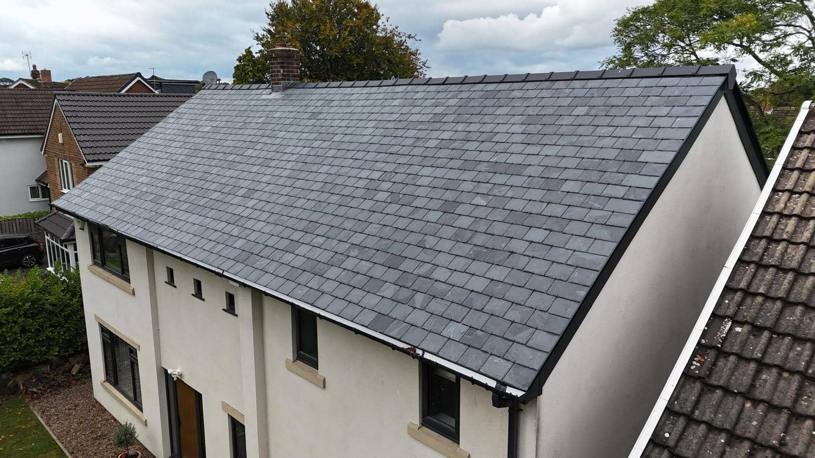 Completed new slate roof on a residential house