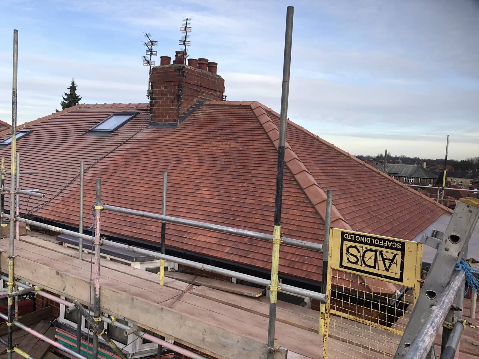 Re-roofing a semi-detached house in Slough with scaffolding